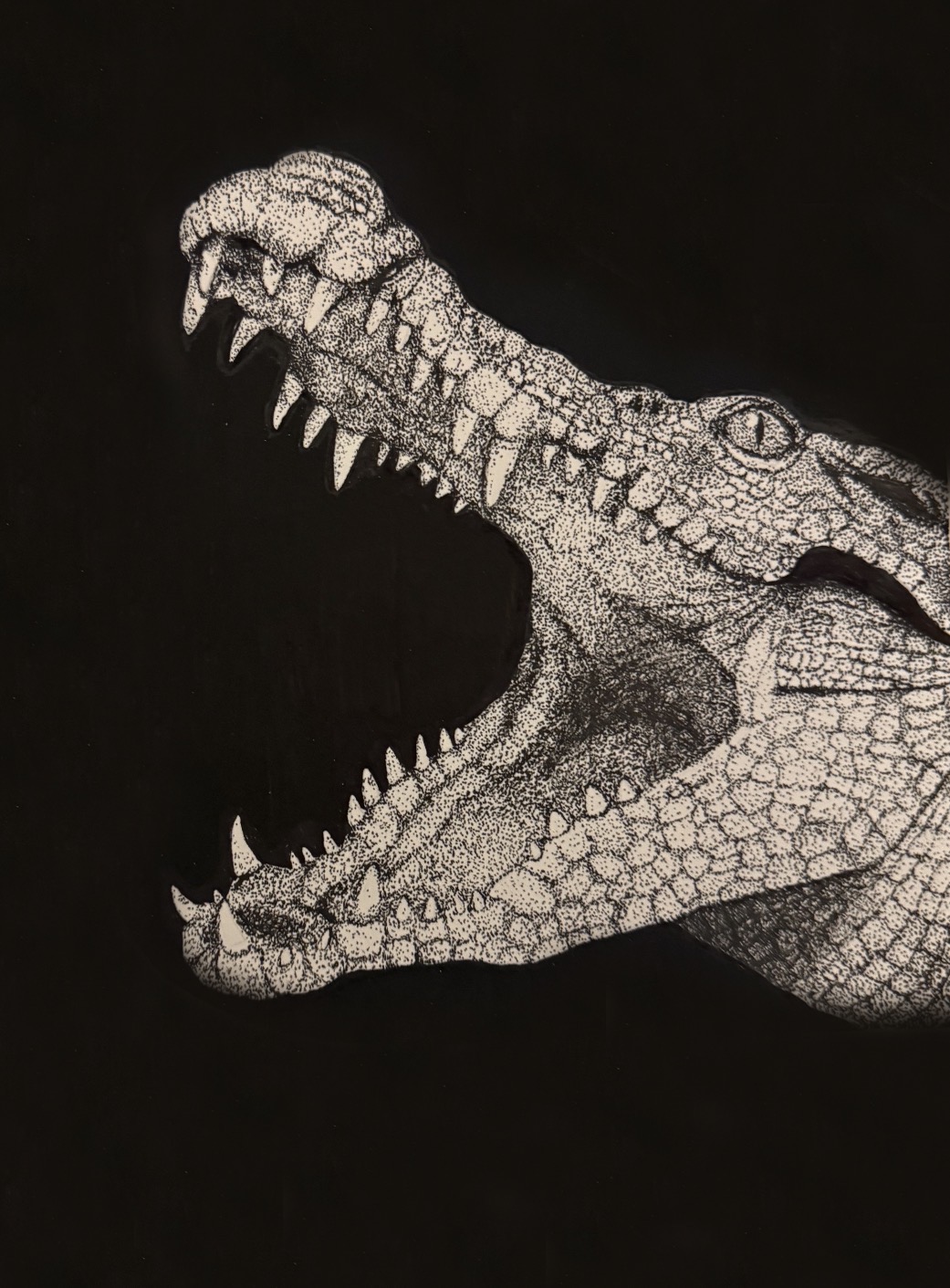 Stippled ink drawing of a crocodile with its jaws wide open, on a black background