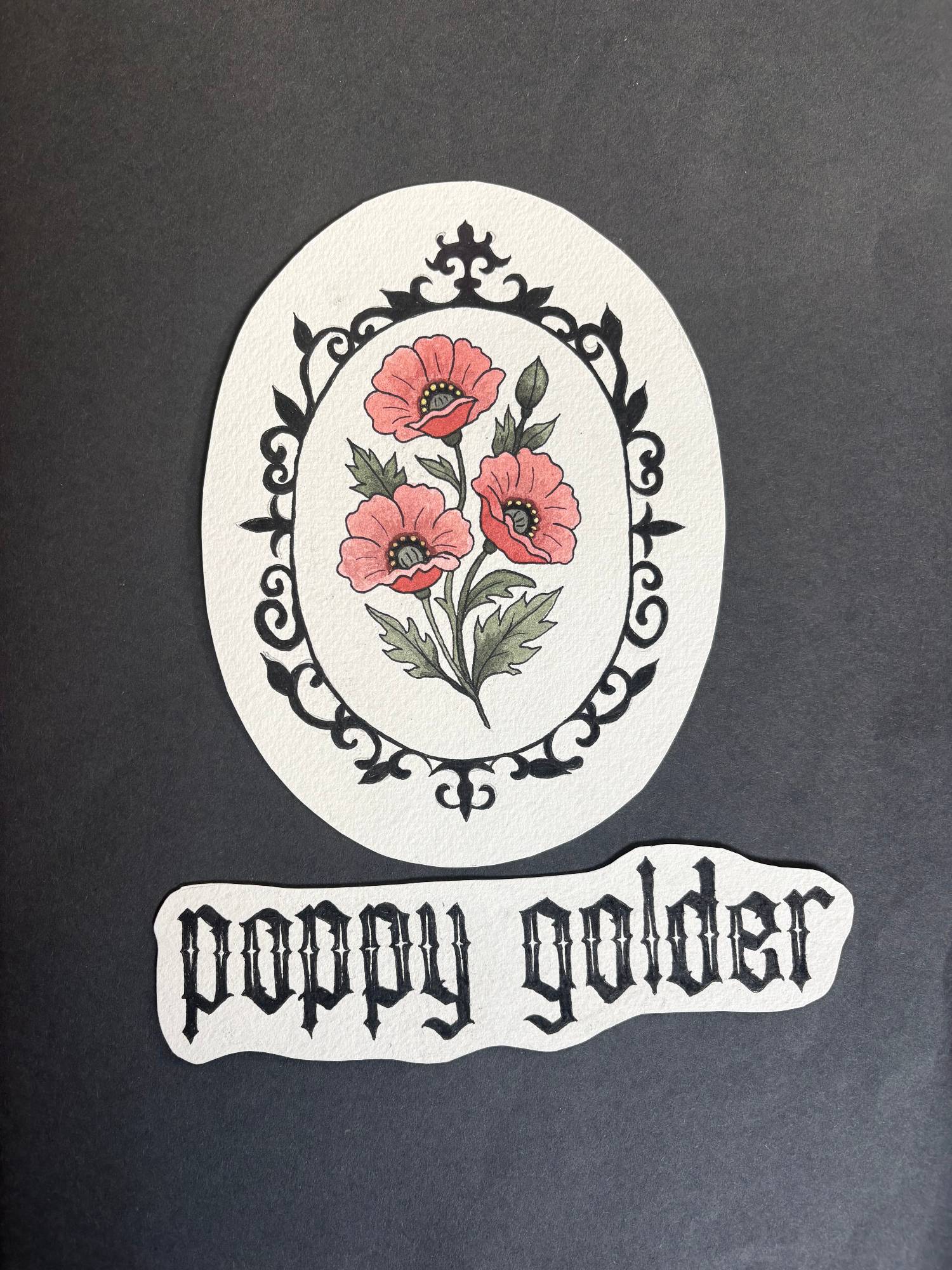 Hand-drawn logo: three red poppies in an ornate black oval frame above the name poppy golder in gothic lettering